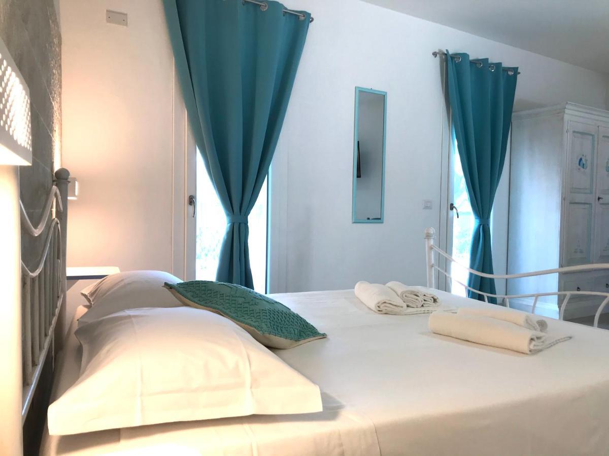 Angolo Mare Apartments & Rooms Porto Pino Ngoại thất bức ảnh